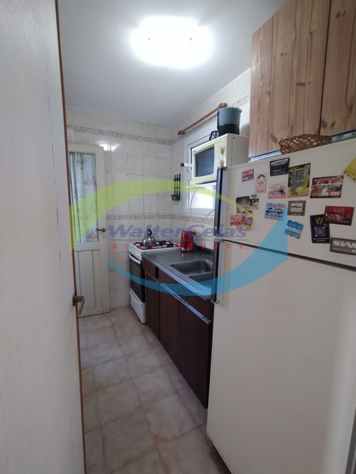DEPARTAMENTO 2 AMBIENTES - GESELL CENTRO - GAS NATURAL Y COCHERA 