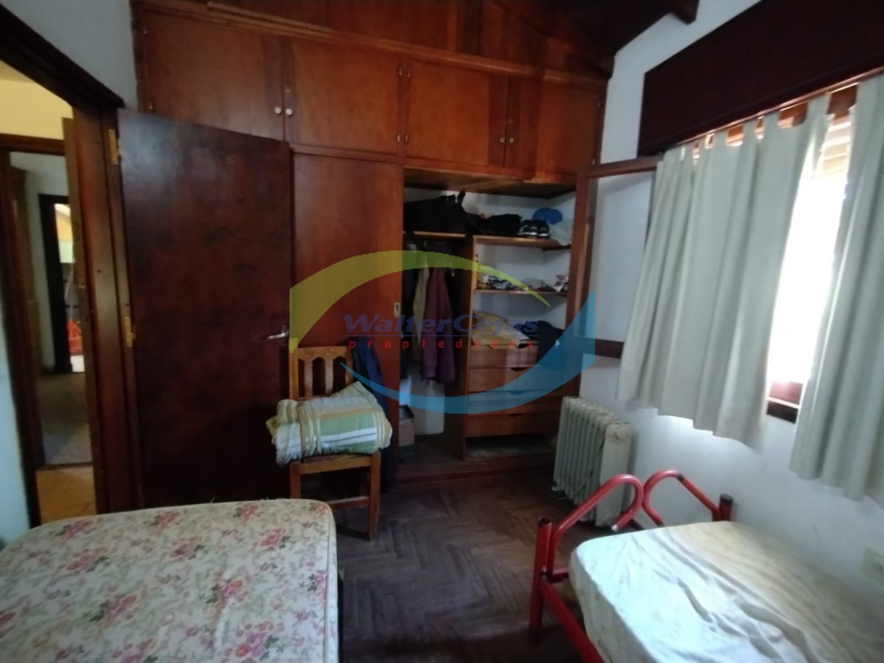 CASA EN VENTA SOBRE LOTE MULTIFAMILIAR HOTELERO